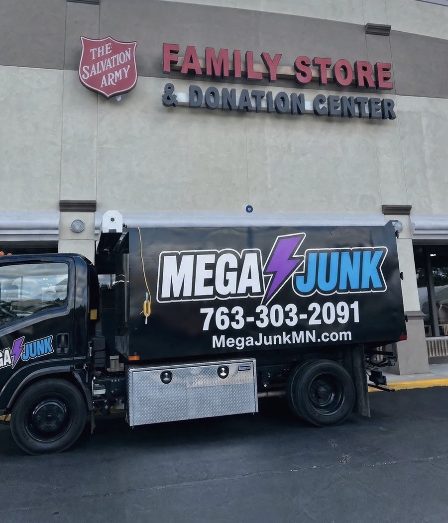 MEGAJUNK truck parked outside a Salvation Army Family Store and Donation Center in the Twin Cities